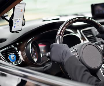 A man is driving a car